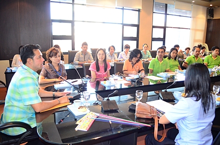 Mayor Itthiphol Kunplome meets with health and AIDS social workers at City Hall.
